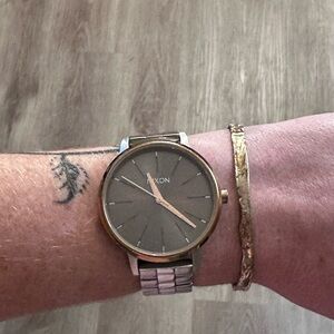 Nixon Women’s Silver and Gold Watch